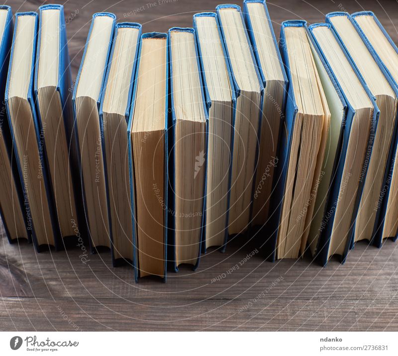 stack of books in a blue cover Reading Table Science & Research School Academic studies Group Book Library Paper Collection Wood Study Blue Brown Yellow Wisdom