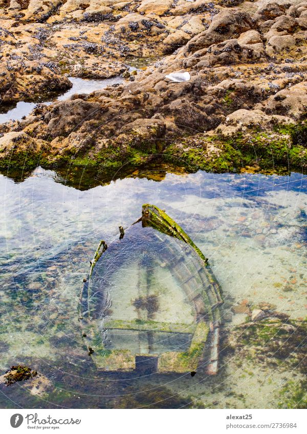 Sunken wooden boat in the sea Ocean Sky Coast Watercraft Wood Old Blue background Deep fish fishing float marine Shipwreck Sink Go under sunken vessel water