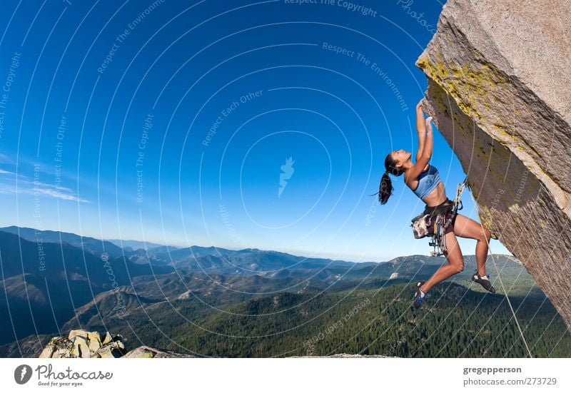 Rock climber dangling. Fitness Life Adventure Climbing Mountaineering Success Feminine Woman Adults 1 Human being 18 - 30 years Youth (Young adults) Peak Hang