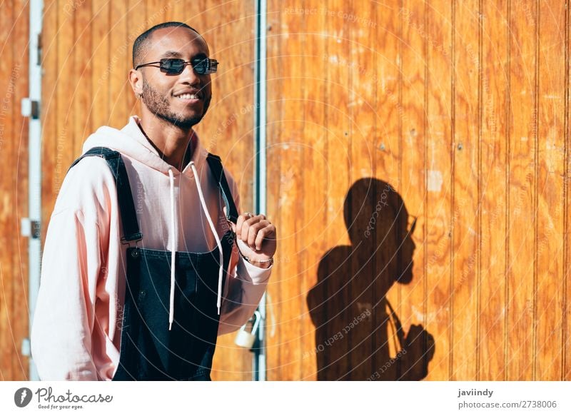 Young black man wearing casual clothes and sunglasses outdoors Lifestyle Happy Beautiful Human being Masculine Young man Youth (Young adults) Man Adults 1