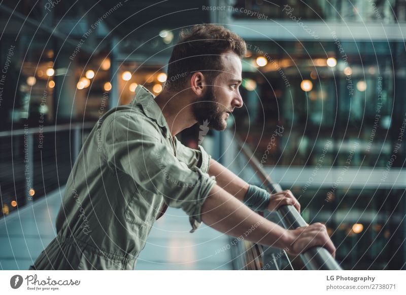 Portrait of a man in a jumpsuit Beautiful Body Masculine Homosexual Man Adults Building Fashion Beard Metal Think Simple Eroticism Modern Gray White fit