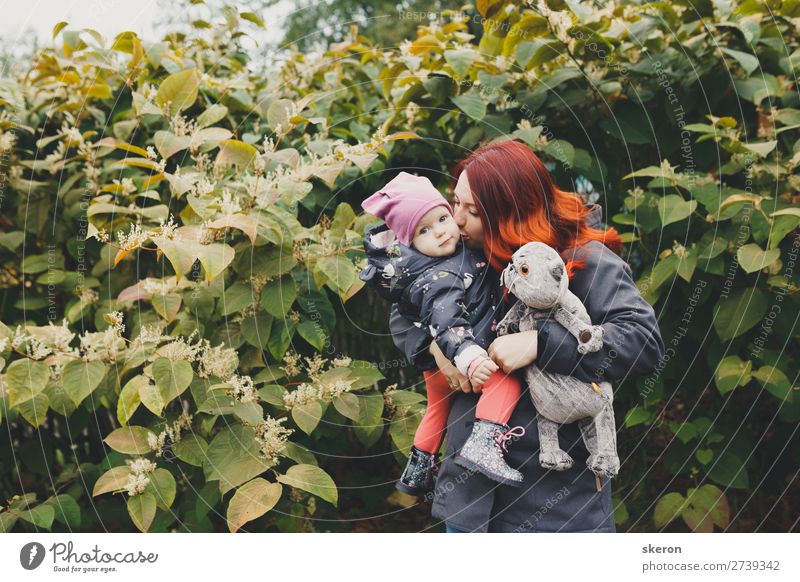 happy family: mom and daughter on a walk Lifestyle Leisure and hobbies Adventure Going out Parenting Education Kindergarten Child Human being Feminine Baby