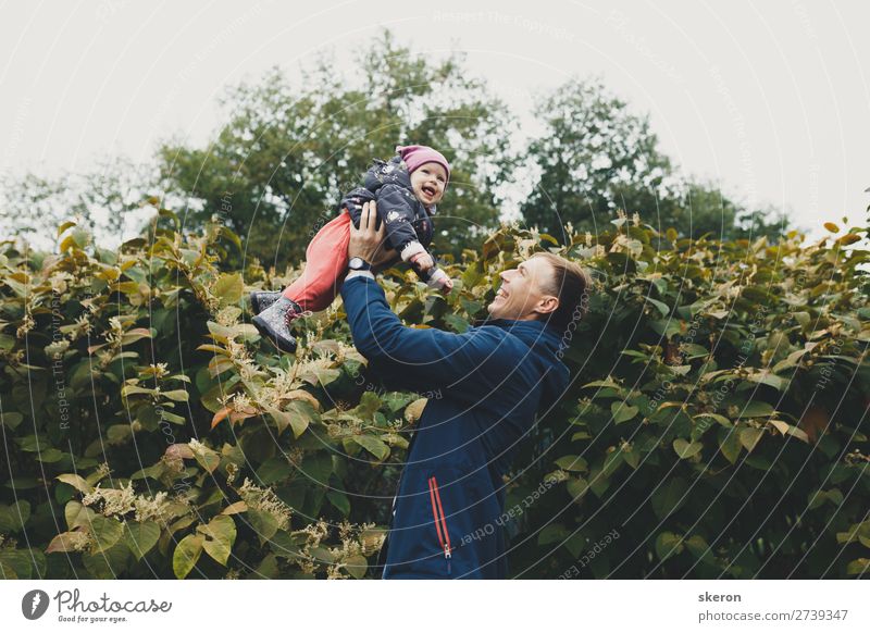 dad holds his daughter in his arms Lifestyle Leisure and hobbies Playing Vacation & Travel Tourism Adventure Freedom Entertainment Event Birthday Sports