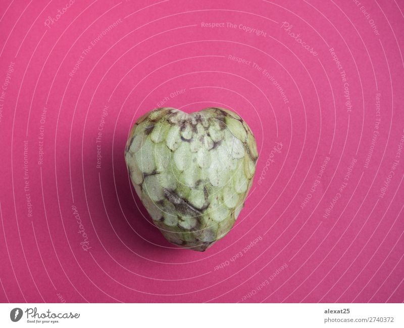 Custard apple on red background Food Fruit Apple Dessert Nutrition Vegetarian diet Exotic Healthy Nature Heart Fresh Green Red Black antioxidant Cherimoya