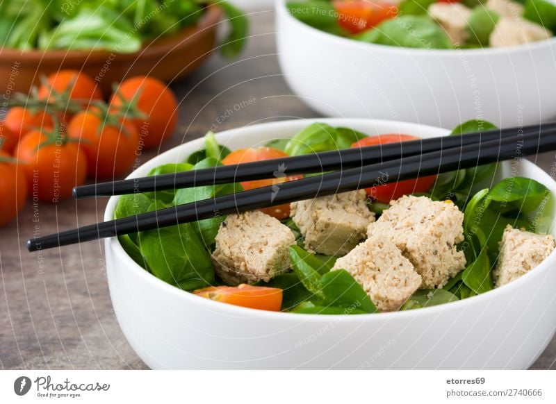 Vegan tofu salad with tomatoes and lamb's lettuce in bowl Salad Tofu Tomato Lamb's lettuce Healthy Healthy Eating Diet Vegan diet Vegetarian diet Leaf Chopstick