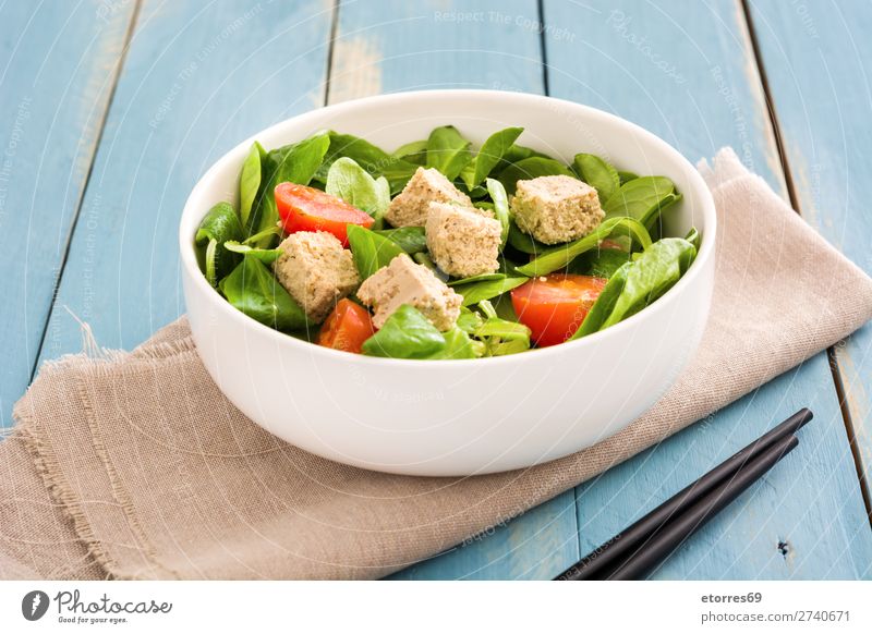 Vegan tofu salad with tomatoes and lamb's lettuce in bowl Salad Tofu Tomato Lamb's lettuce Healthy Healthy Eating Diet Vegan diet Vegetarian diet Leaf Chopstick