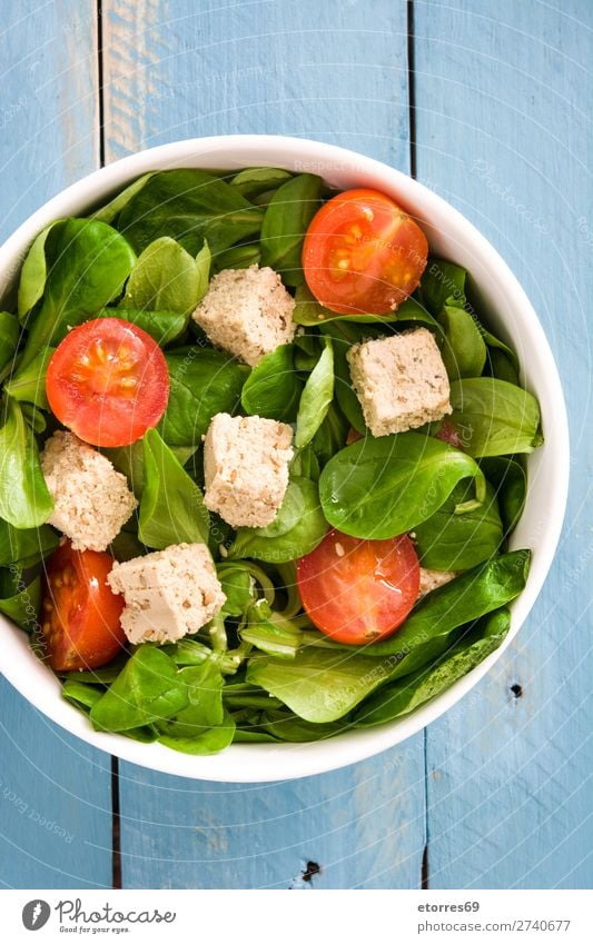 Vegan tofu salad with tomatoes and lamb's lettuce Salad Tofu Tomato lambs lettuce Healthy Diet Vegan diet Vegetarian diet Leaf Chopstick Cherry Raw Green Bowl