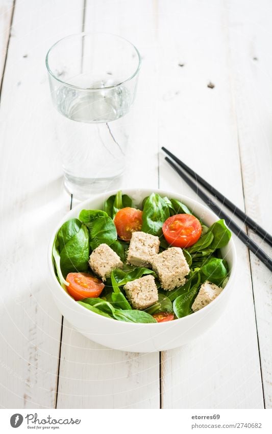 Vegan tofu salad with tomatoes and lamb's lettuce in bowl Salad Tofu Tomato Lamb's lettuce Healthy Healthy Eating Diet Vegan diet Vegetarian diet Leaf Chopstick