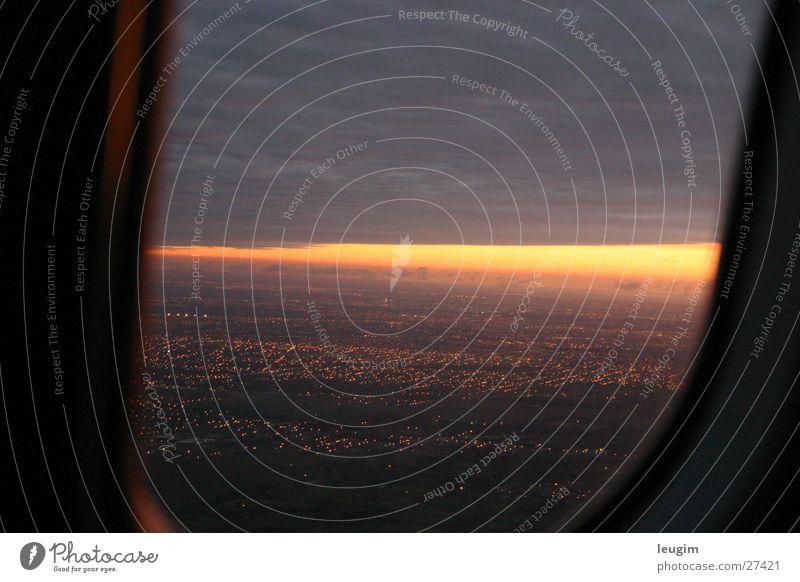 beginning Buenos Aires Red Yellow Town Airplane Window Clouds Dark Stairs Sun Light