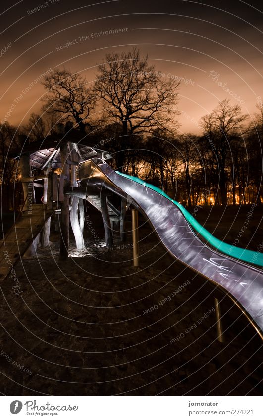 Lightscribe Art I - Illuminated Slide Town Orange Turquoise lightscribe Dark Mysterious Lighting Sand Playground Deserted Colour photo Exterior shot