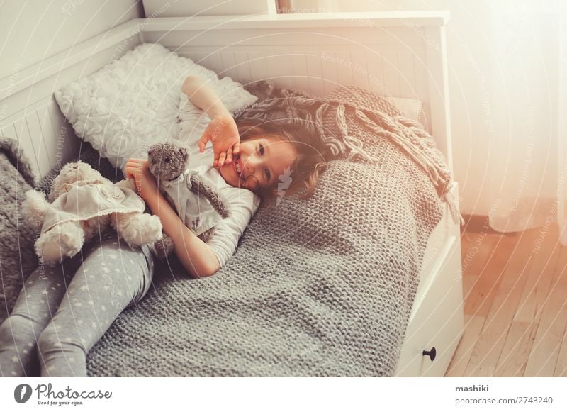 happy kid girl walking up in early morning in her room Lifestyle Joy Happy Relaxation Playing Bedroom Child Friendship Infancy Toys Teddy bear Smiling Laughter