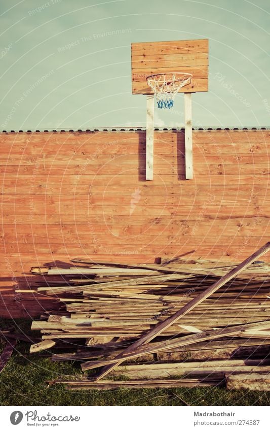 the basketball court Sky Deserted Storage shed Wooden wall Chaos Unused Basketball basket Stack Trash Forget Colour photo Subdued colour Exterior shot Day Heap