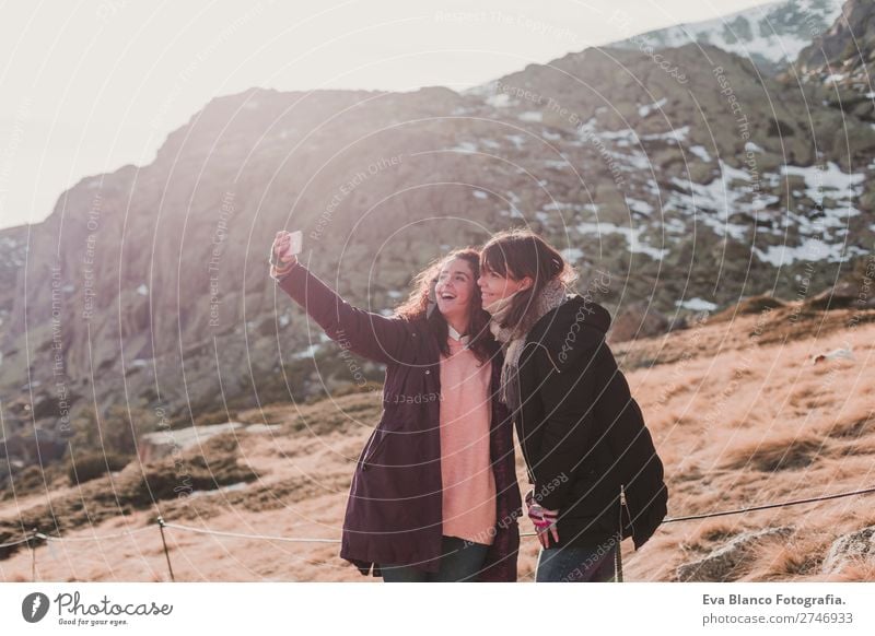 two hiker woman friends enjoyin in the mountain Lifestyle Beautiful Leisure and hobbies Vacation & Travel Adventure Freedom Winter Snow Winter vacation Mountain