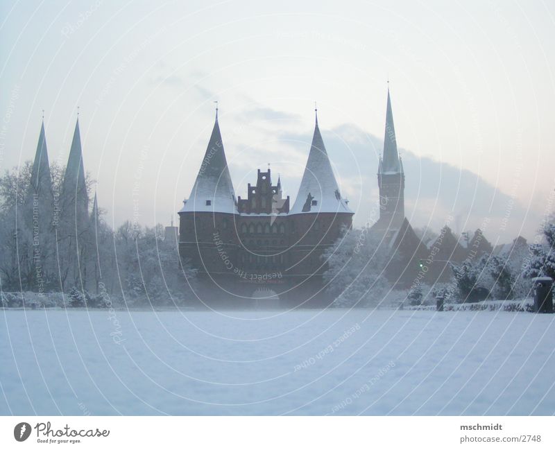 Lübeck in winter Hanseatic League Winter Historic holstentor Snow Landmark Tourist Attraction Historic Buildings Famous building Famousness Copy Space bottom