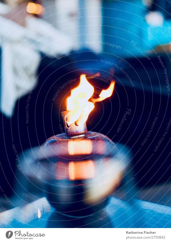 Fire Lamp Glittering Blue Yellow Gold Black White Flame Dusk Evening Relaxation To enjoy Heat Colour photo Exterior shot Deserted Twilight Light