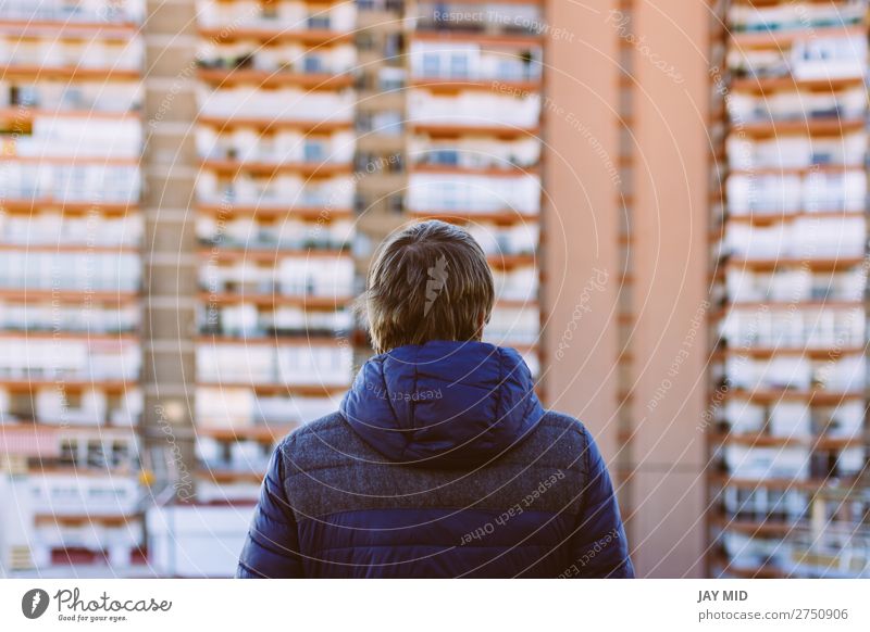 blond man standing on rooftop terrace looking at the building Lifestyle Style Winter Masculine Man Adults Youth (Young adults) 1 Human being 30 - 45 years