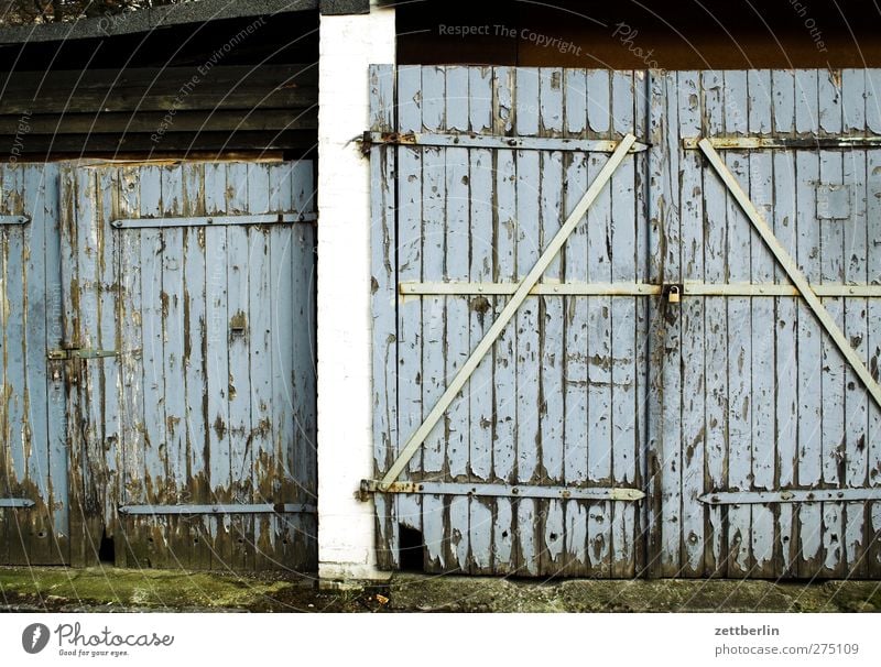 Gate with Z Village Small Town Old town House (Residential Structure) Manmade structures Building Architecture Gray Car door Closed Garage door Barn Lock