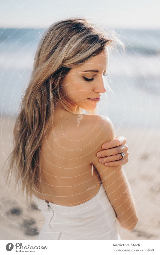 Tender girl in bridal dress on beach Woman Bride To enjoy Beach Sunlight Dress tenderness Youth (Young adults) in love Considerate Natural embracing human face