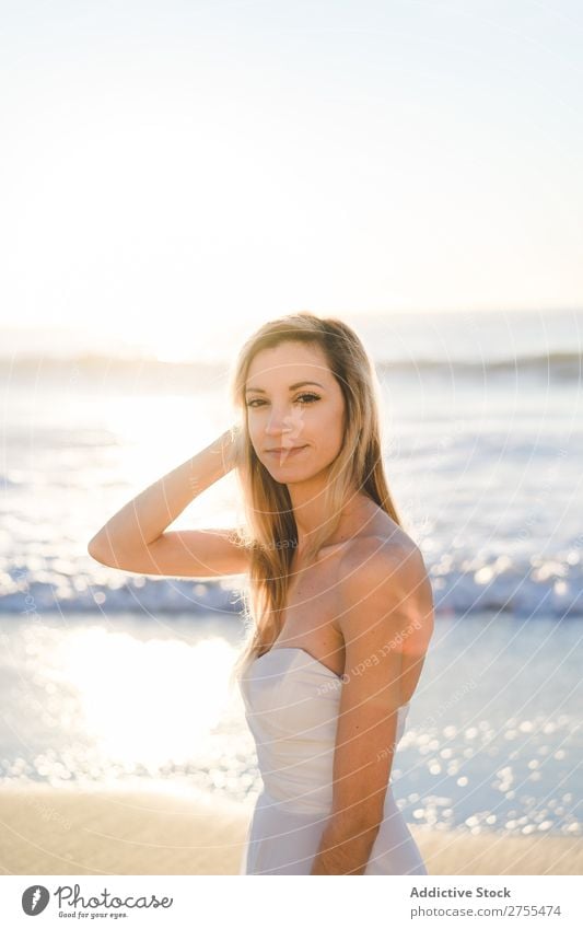 Wonderful tender bride in sunlight Woman Bride Happiness Beach Portrait photograph Cheerful human face seaside Dress in love seascape Blonde Engagement Sun