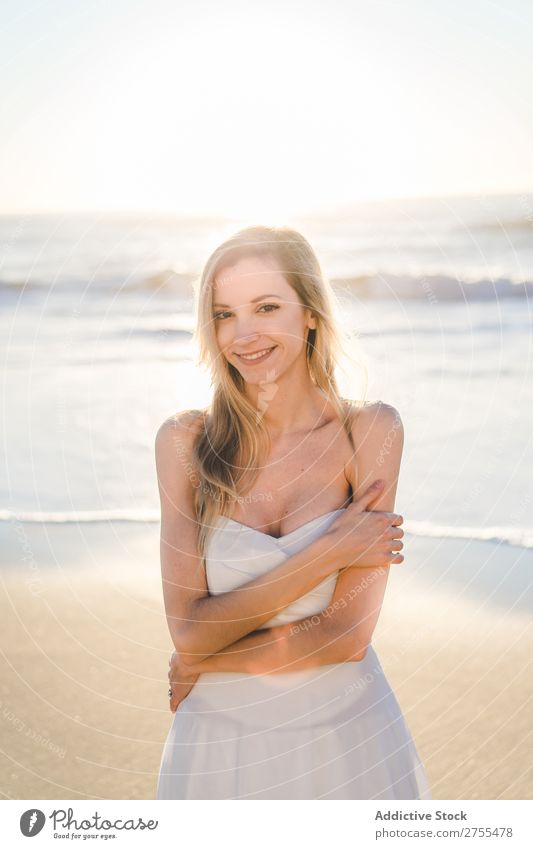 Wonderful tender bride in sunlight Woman Bride Happiness Beach Portrait photograph Cheerful human face seaside Dress in love seascape Blonde Engagement Sun