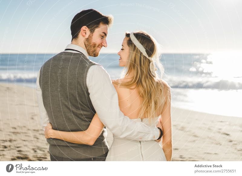 Bridal couple embraced on the beach Couple bridal Beach tender in love Wedding Expression romantic Feasts & Celebrations Style Relationship Love Engagement