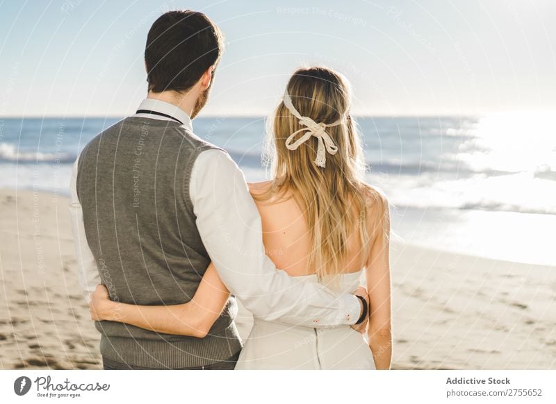 Bridal couple embraced on the beach Couple bridal Beach tender in love Wedding Expression romantic Feasts & Celebrations Style Relationship Love Engagement