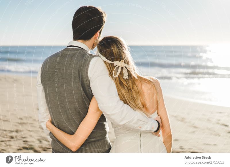 Bridal couple embraced on the beach Couple bridal Beach tender in love Wedding Expression romantic Feasts & Celebrations Style Relationship Love Engagement