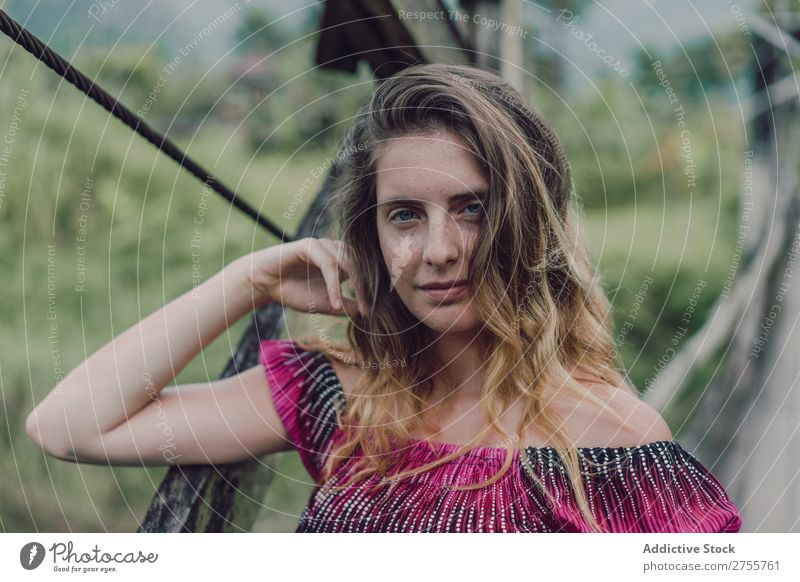 Pretty woman on wooden bridge Woman pretty Posture Nature Wood grungy Bridge Green Sunbeam Day Beautiful Beauty Photography Natural Youth (Young adults)