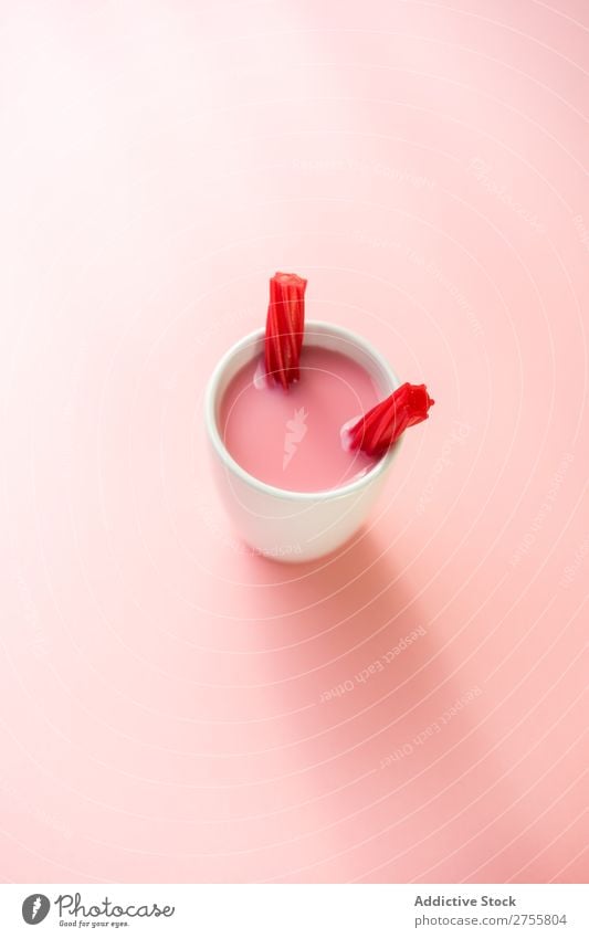 Sweet pink drink with jelly candies Drinking Jelly Pink minimalist Cup Mug Confectionary Milkshake Indulgence White flavored Studio shot Sugar Dessert garnish