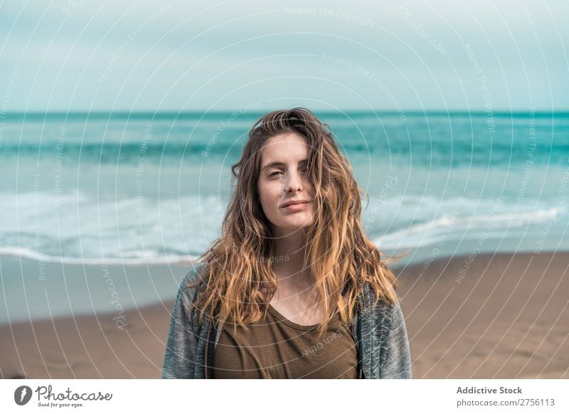 Woman posing on blue ocean Ocean Posture Tourism Portrait photograph Vacation & Travel Paradise human face Easygoing tropic Adventure Tourist Style Lagoon