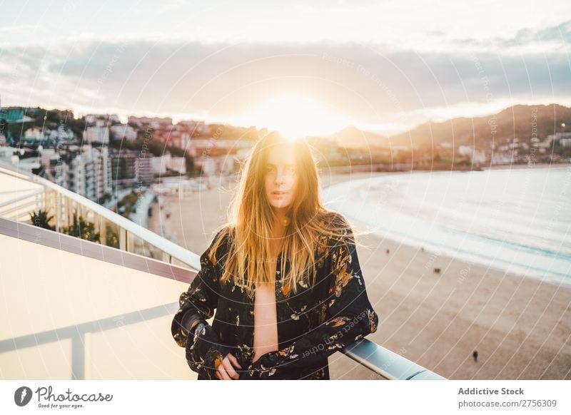 Young dreamy woman at seaside Woman Youth (Young adults) Coast Ocean Stand pretty Attractive Nature Water Vacation & Travel Beach San Sebastián Spain Beautiful