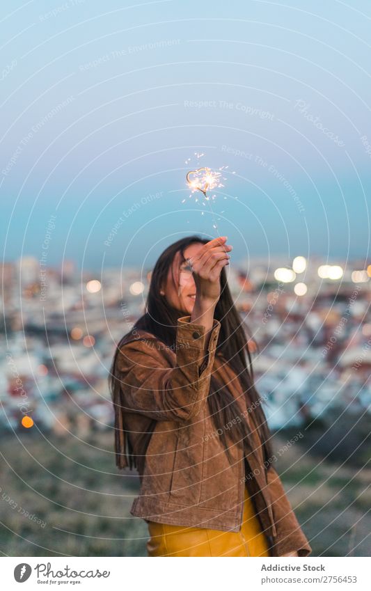 Cheerful young woman with sparkler Woman pretty Nature Sparkler Beautiful Portrait photograph Youth (Young adults) Beauty Photography Model Attractive Fashion