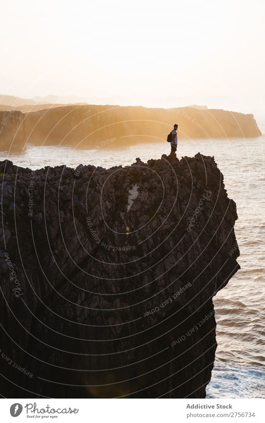 Person on cliff Human being Cliff Ocean Nature Vacation & Travel Sky Rock Stone Coast Bay Vantage point Beautiful Idyll Picturesque Serene Water Peaceful Calm