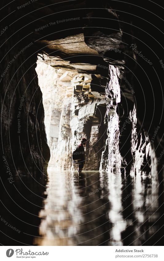 Man standing at cave Cliff Ocean Nature Vacation & Travel Sky Human being Rock Stone Coast Bay Vantage point Beautiful Idyll Picturesque Serene Water Peaceful