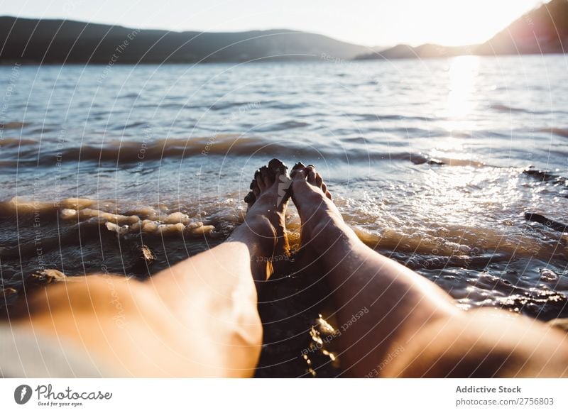 Crop man posing on beach Man Water Human being Vacation & Travel Nature Relaxation Ocean Lake Resting Calm tranquil Serene Peaceful Dark Deep Wet Cold enjoying