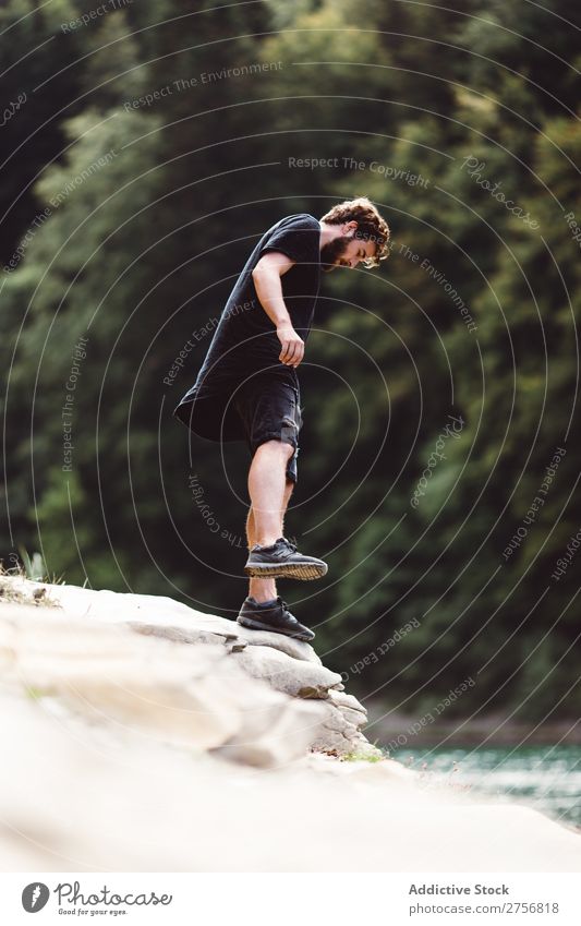 Man standing on a stone by the river Tourist Forest Hiking Vacation & Travel River Coast Stand Nature Adventure Trip Human being Lifestyle Tourism