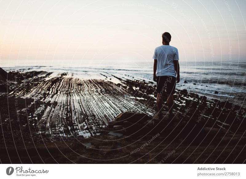 Man posing on rock Tourist Cliff Ocean Rock Vacation & Travel Tourism Nature Landscape Coast Water Sun Freedom Stone Natural Lifestyle Beautiful Vantage point