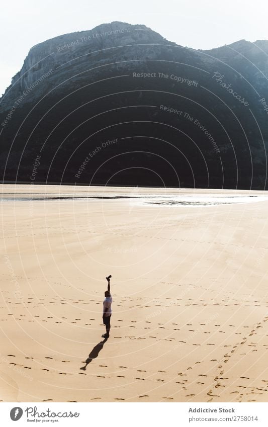 Man extended arm on beach Hand Sand Beach Wet Summer Ocean Vacation & Travel Nature Human being Sunlight Leisure and hobbies Relaxation Tropical seaside Sunbeam