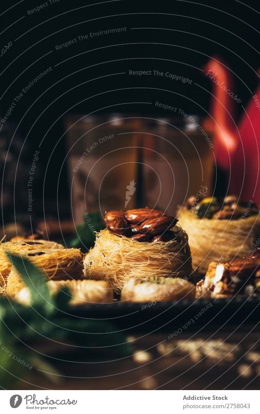 Detail of syrian pastry with tea Above arabic Breakfast Brown bulbul Cooking Delicious Dessert Dish Drinking Food Fork Glass Gourmet indoor Kettle knafeh Mint