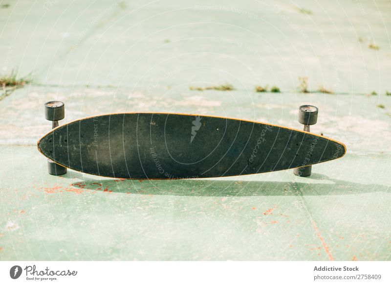 Close up view of skateboard on floor. Skateboard Close-up Story Crops Skateboarding Sports Ice-skates Longboard Board Equipment Ice-skating Wheel