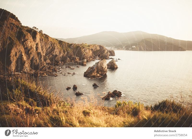 Big coastal rocks at seaside Hill Mountain Nature Landscape Rock Ocean Stone Water Evening Vacation & Travel Beautiful Vantage point Summer Tourism Environment