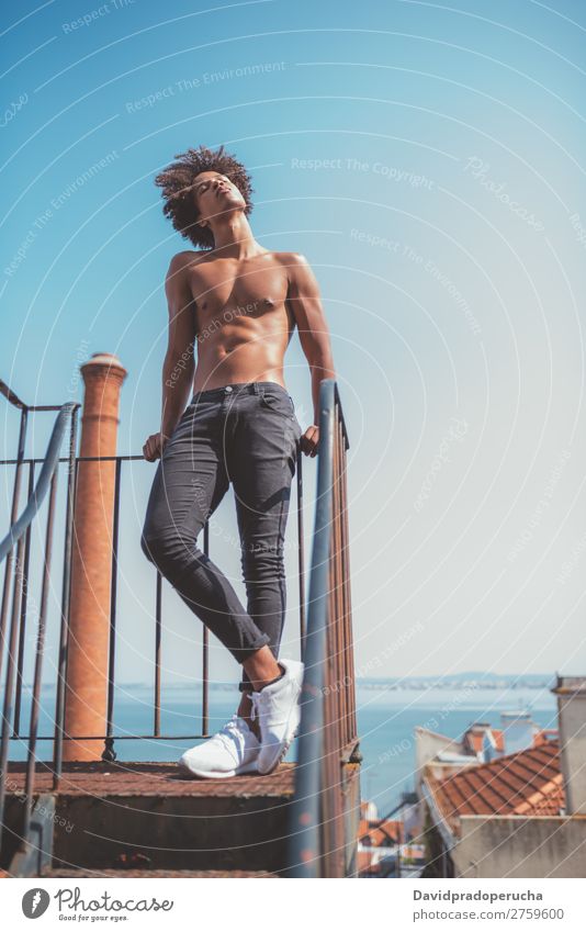 shirtless young black man on the stairs Man Black Youth (Young adults) Athlete Naked Torso Human being Mixed race ethnicity Afro Curly hair Healthy Body Fitness