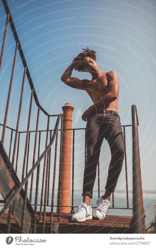 shirtless young black man on the stairs Man Black Youth (Young adults) Athlete Naked Torso Human being Mixed race ethnicity Afro Curly hair Healthy Body Fitness