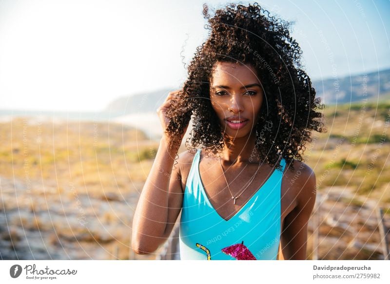 Beautiful young woman wearing a swimming suit at the beach Beach Woman Bikini Black Bridge Background picture Coast Curly hair Destination Girl Cute pretty Hair