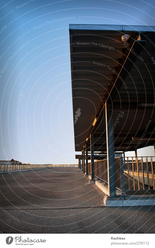 roof Germany Europe Town Overpopulated Deserted Parking garage Stairs Balcony Terrace Roof Blue Black Colour photo Exterior shot Copy Space right Copy Space top