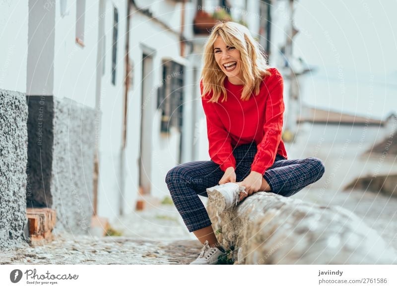 Smiling blonde girl with red shirt enjoying life outdoors. Lifestyle Style Happy Beautiful Hair and hairstyles Human being Feminine Young woman