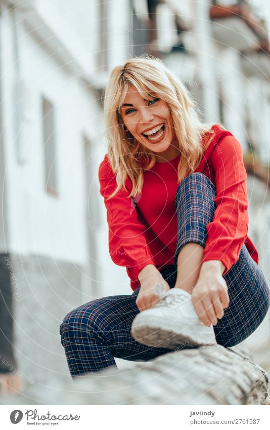 Smiling blonde girl with red shirt enjoying life outdoors. Lifestyle Style Happy Beautiful Hair and hairstyles Human being Feminine Young woman