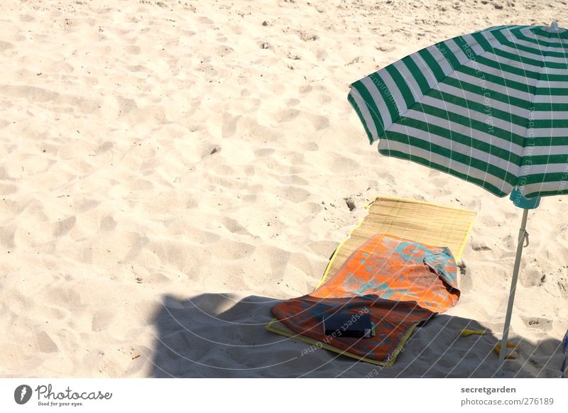 at least on the photo: summer! Relaxation Calm Leisure and hobbies Sand Summer Beautiful weather Beach Reading Warmth Yellow Green Orange Indifferent