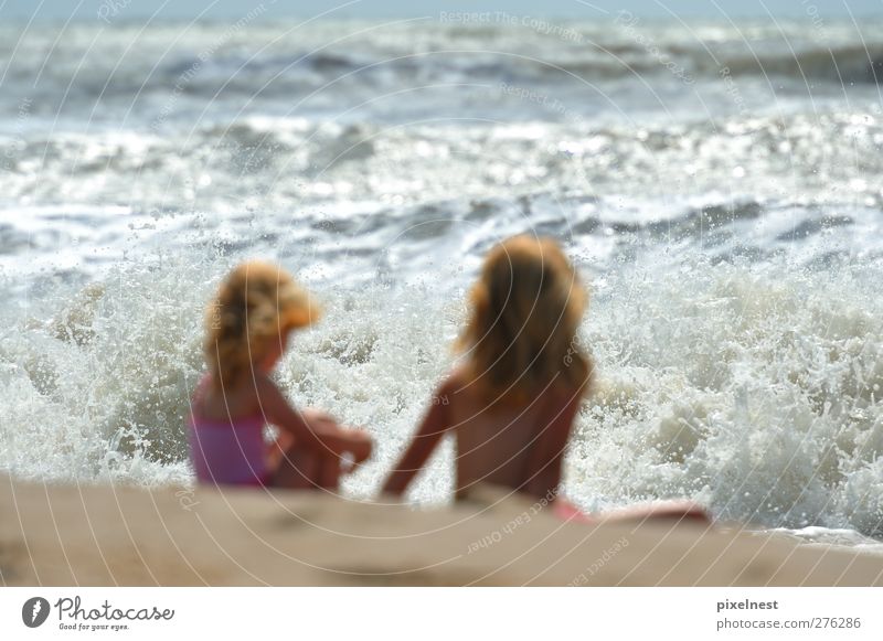 Girl in front of the roaring surf Joy Summer Summer vacation Sun Beach Ocean Waves Human being Feminine Child Brothers and sisters 2 3 - 8 years Infancy Sand