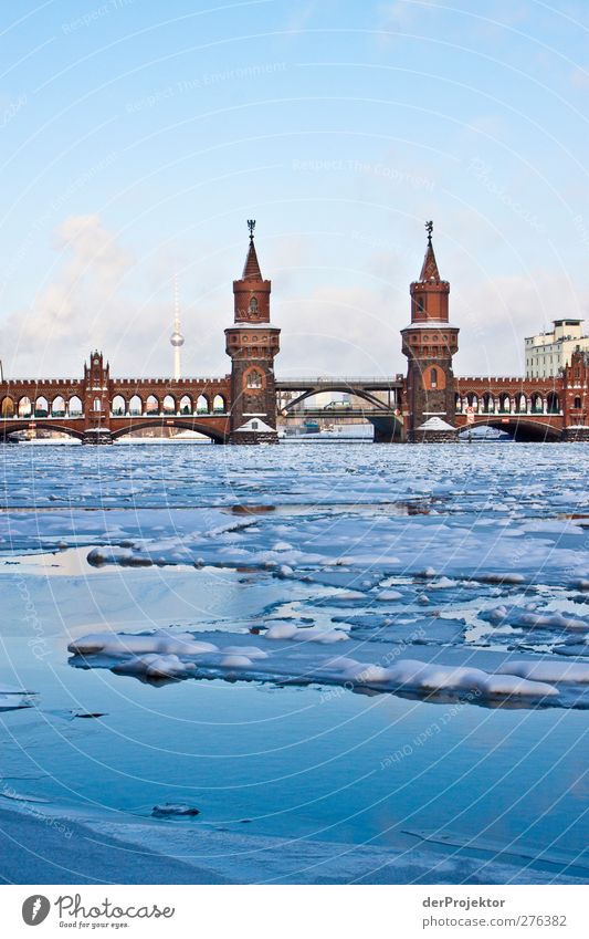 In winter the sun shone in Berlin recently. Winter Capital city Bridge Architecture Landmark Oberbaumbrücke Traffic infrastructure Inland navigation Famousness